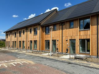 15 houten Premodu woningen voor project Rijnvliet
