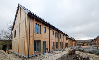 15 houten Premodu woningen voor project Rijnvliet